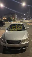 سيارة ميتسوبيشي لانسر EX موديل 2013 فضية للبيع في المزة